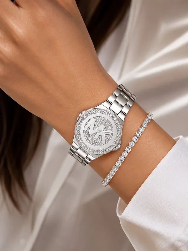 סט שעון מייקל קורס לאישה דגםMichael Kors MKO1222 וצמיד טניס כסף